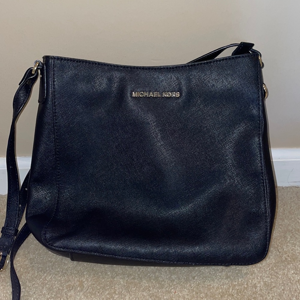 Authentic Michael Kors purse. Black, very good condition.